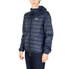 Side view of the navy puffer jacket with a hood and zipper closure, highlighting its quilted design on a white background.