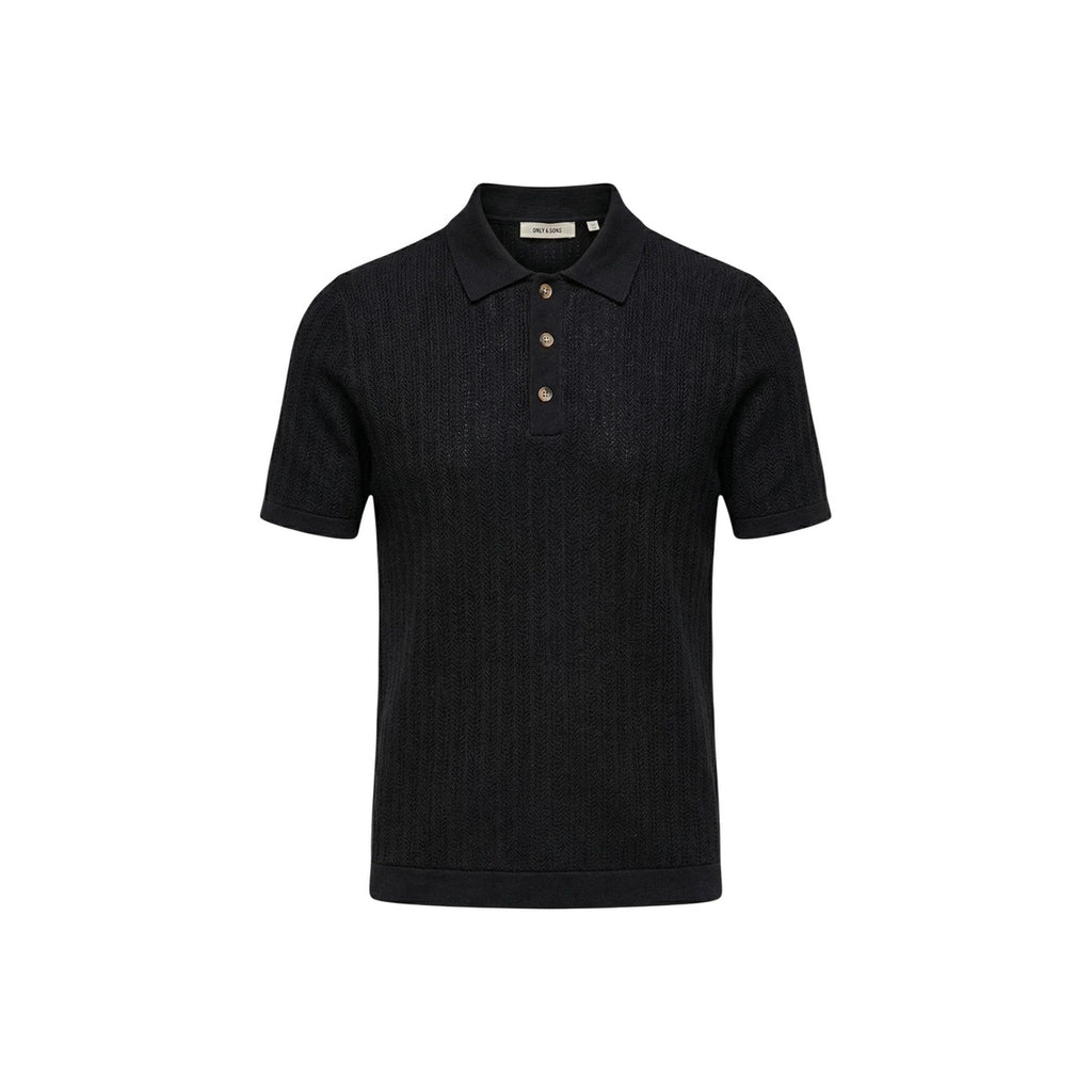 Detail close-up of the black polo shirt highlighting the collar and button placket.