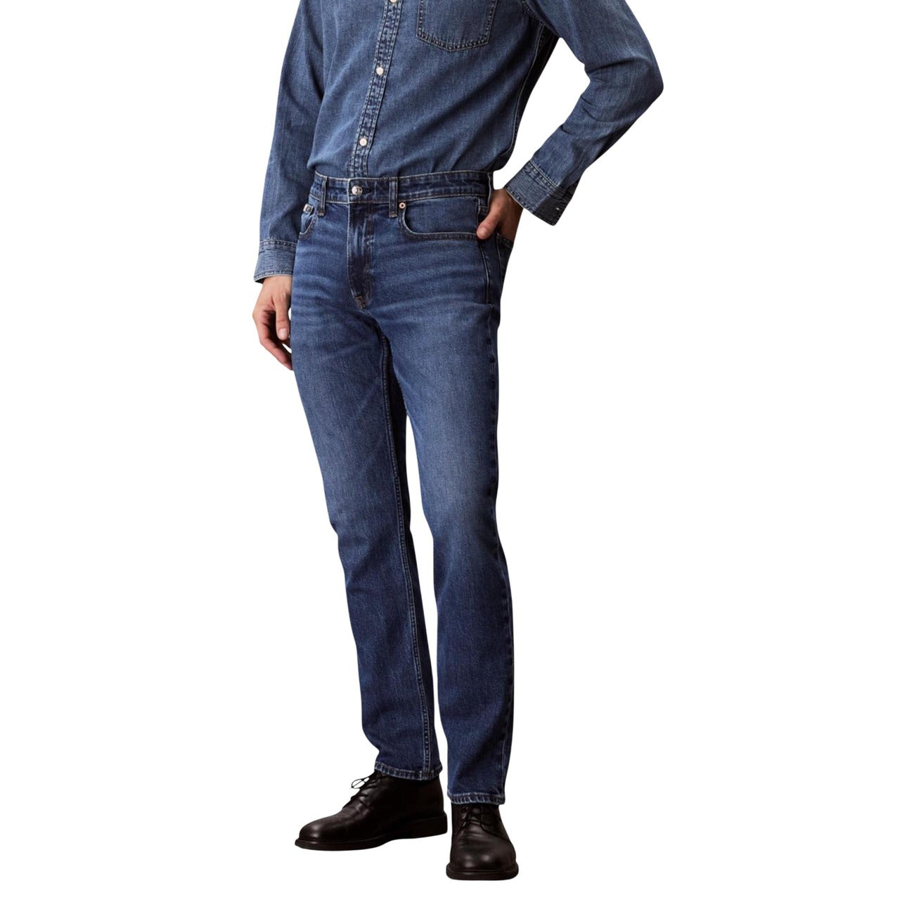 Side view of blue slim fit jeans featuring five pockets on a white background