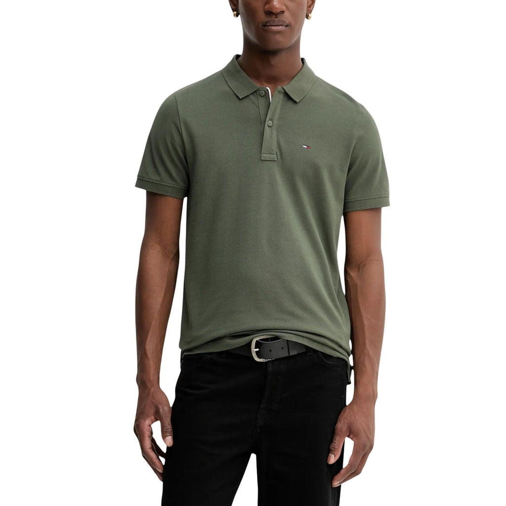 Front view of the green polo shirt featuring short sleeves and a classic collar.