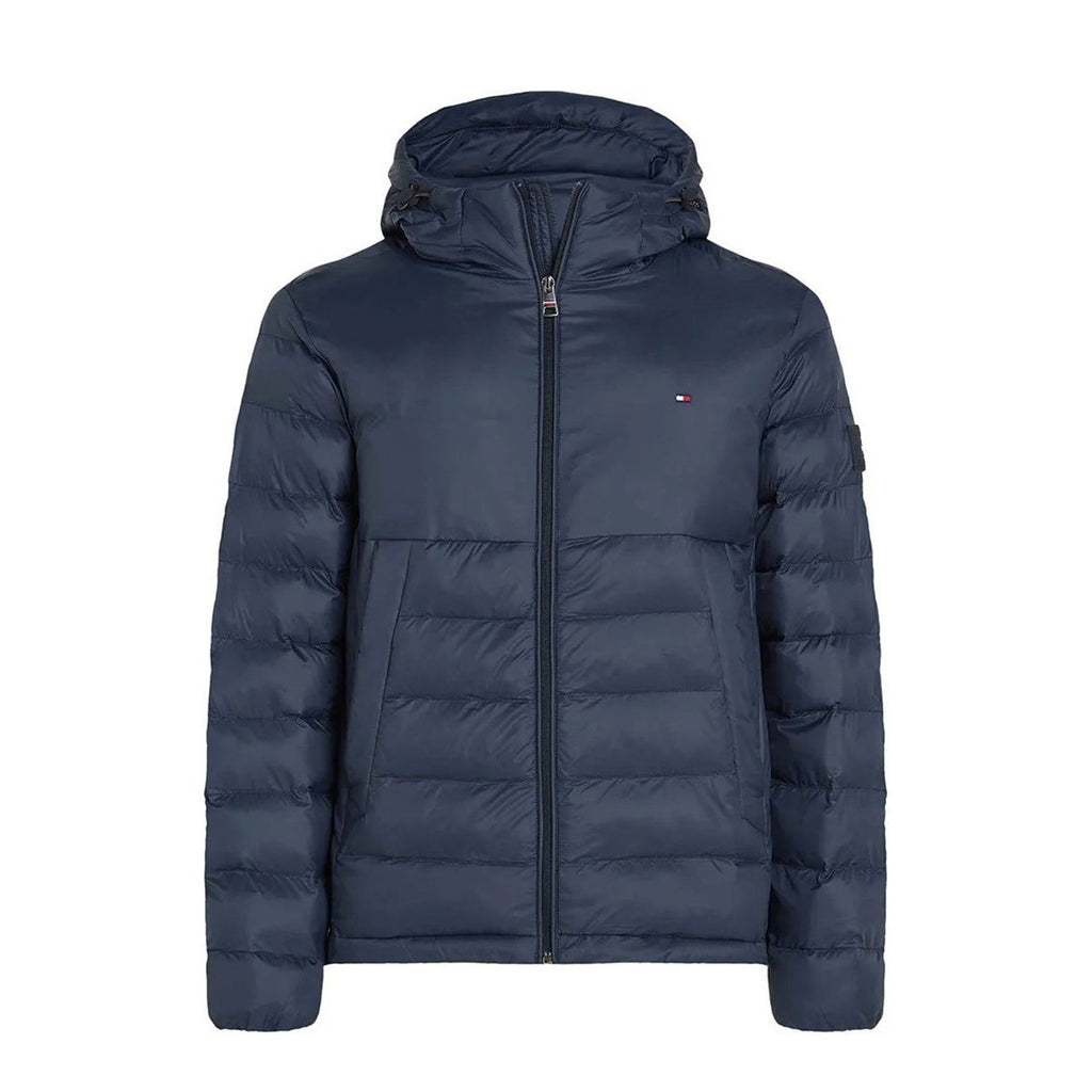 Front view of the navy puffer jacket featuring a hood and zipper closure against a white background.