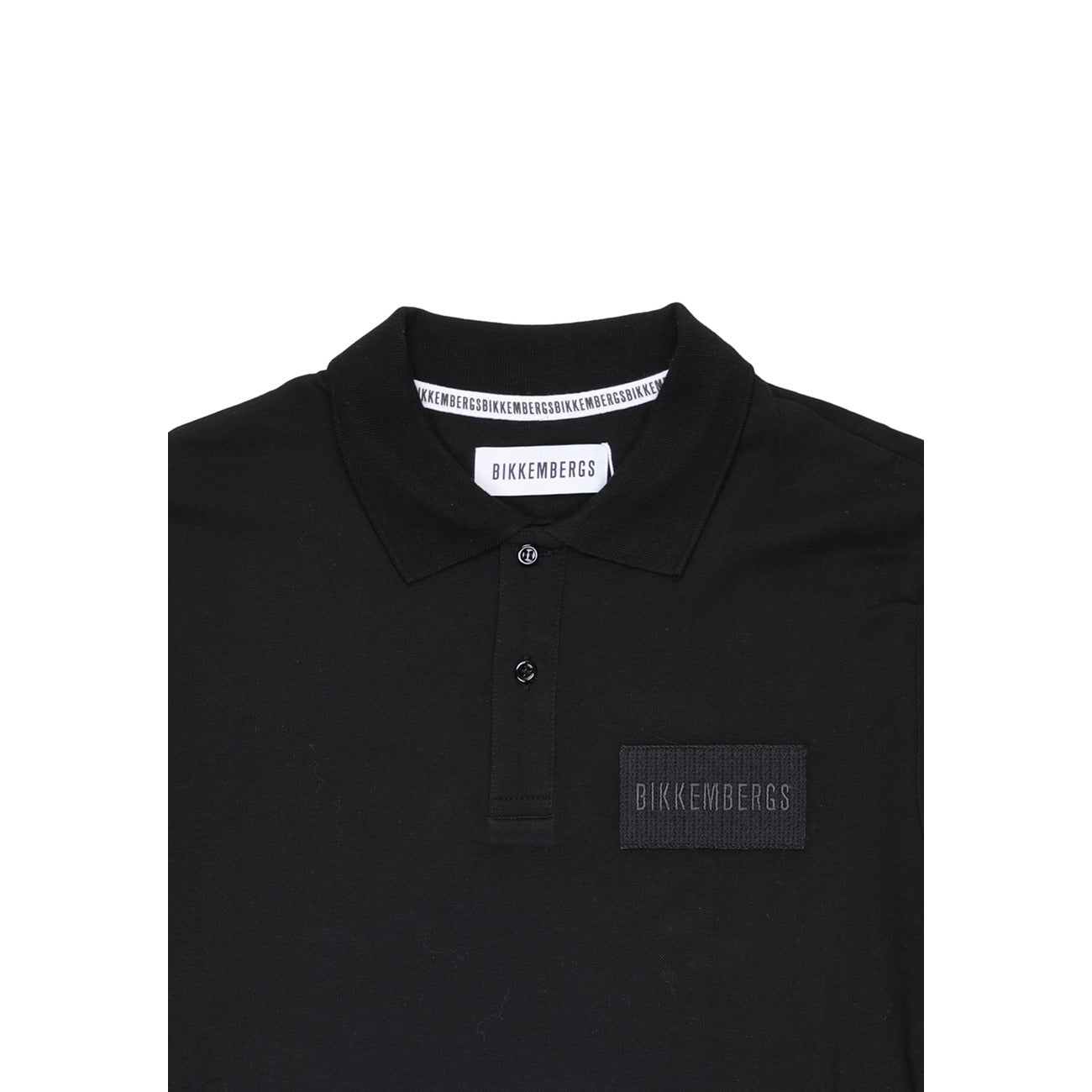 Close-up detail of the black polo shirt highlighting the collar and logo detail on a white background.