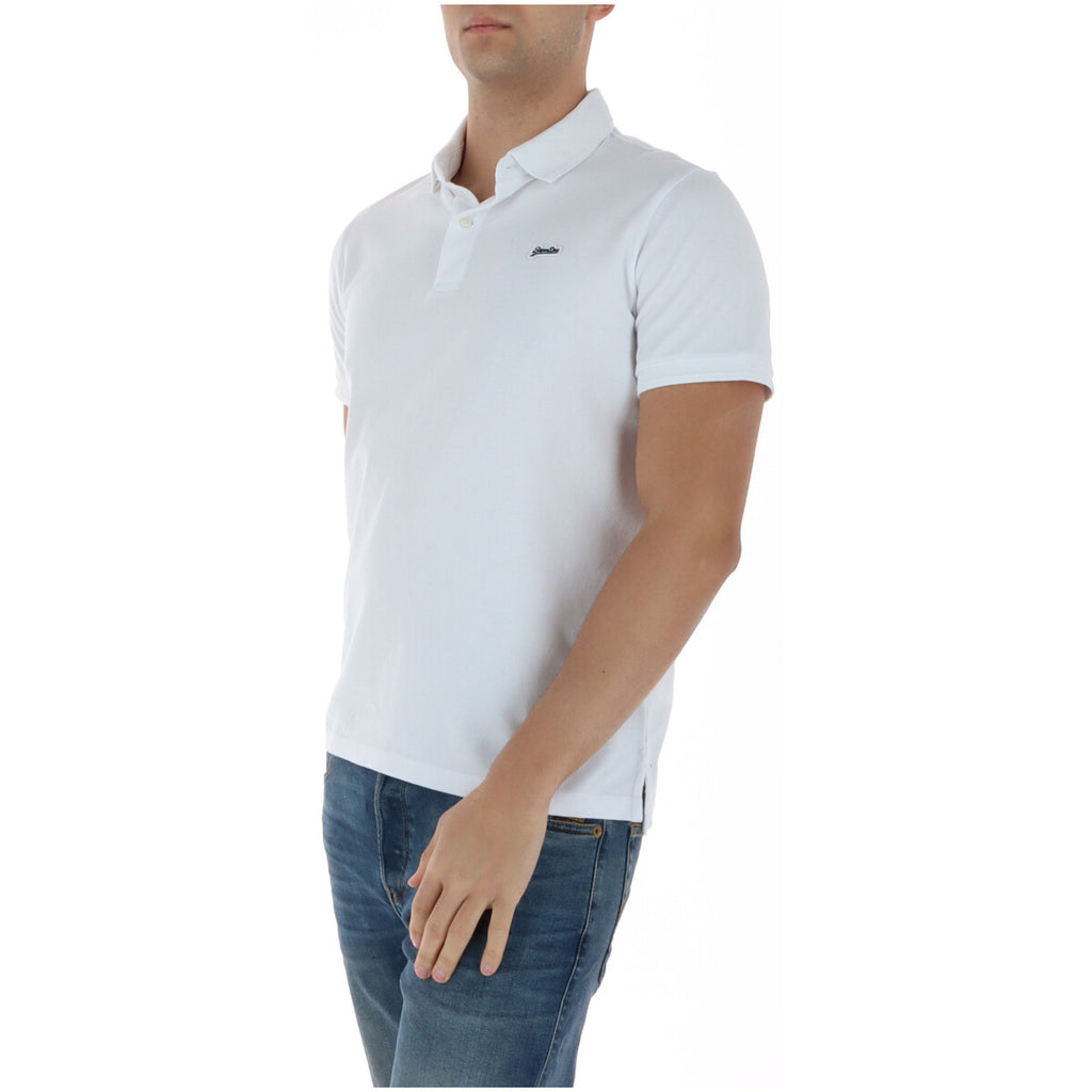 Side view of the white collared polo shirt with short sleeves.
