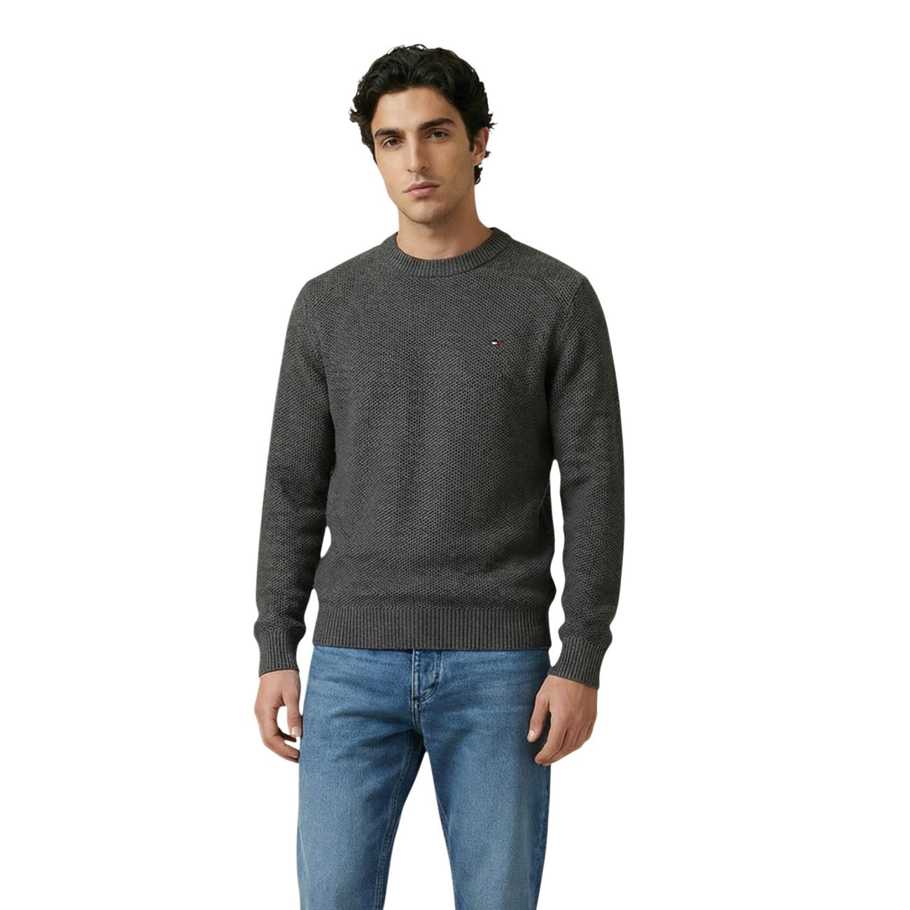 Lifestyle shot of a gray sweater with long sleeves and crew neck against a white background.