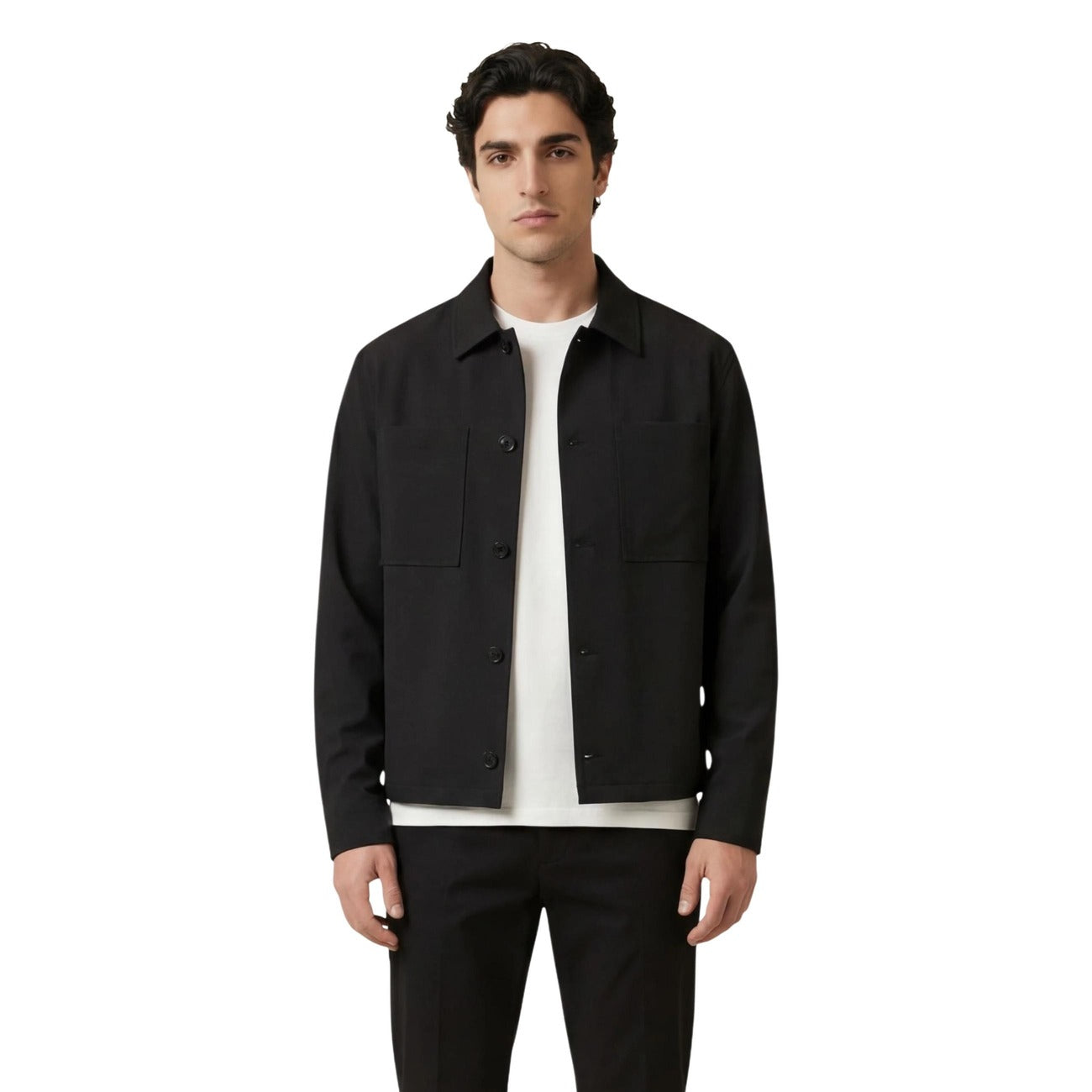 Front view of the black blazer featuring a classic collar and front pockets.