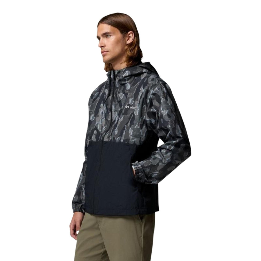Lifestyle shot of a men's black camouflage blazer featuring a hood on a white background.