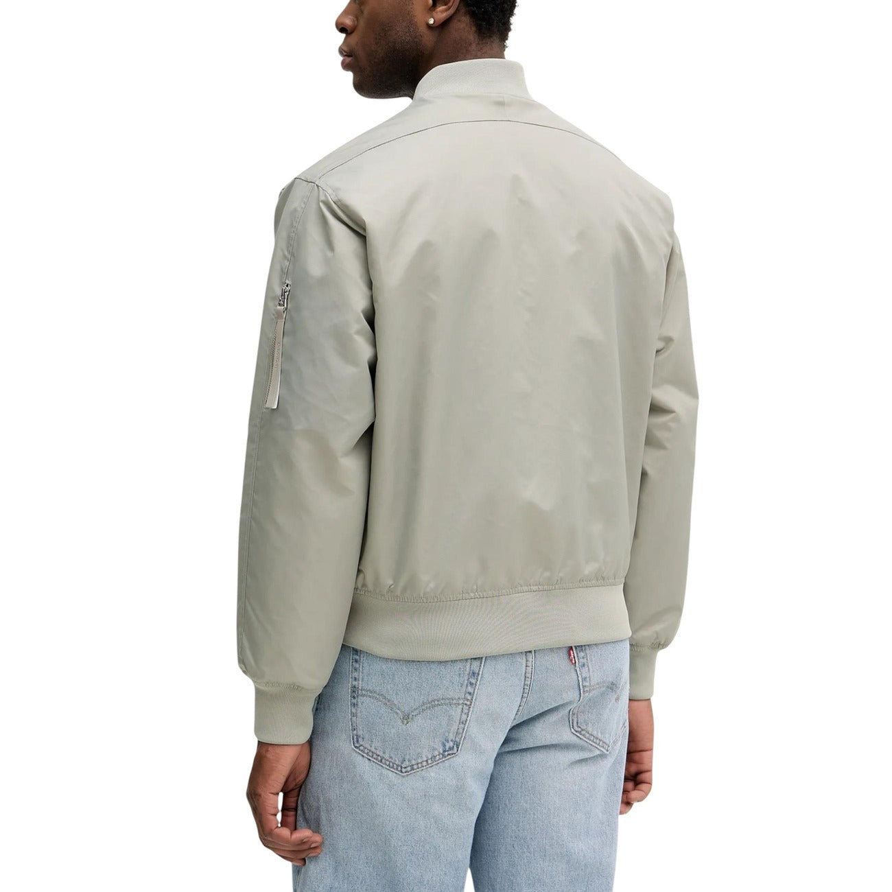 Back view of the green blazer showcasing the ribbed collar on a white background