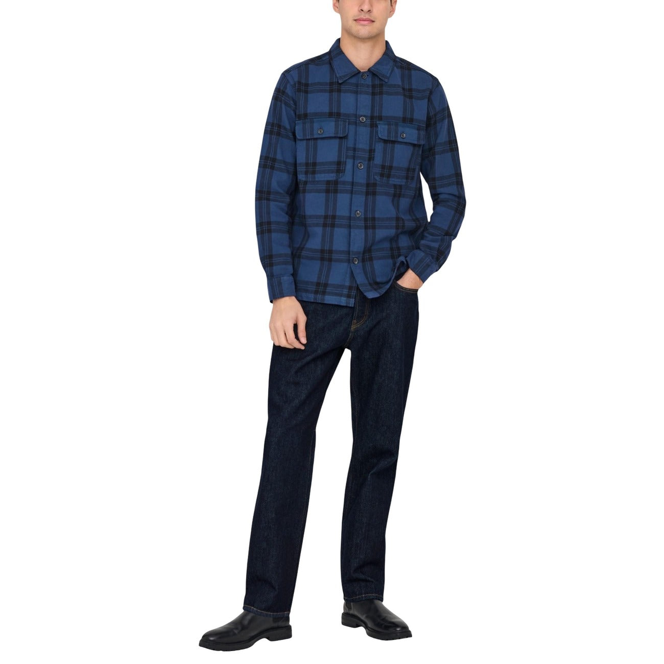 Front view of a man in a plaid shirt wearing blue jeans, featuring a button-up design.