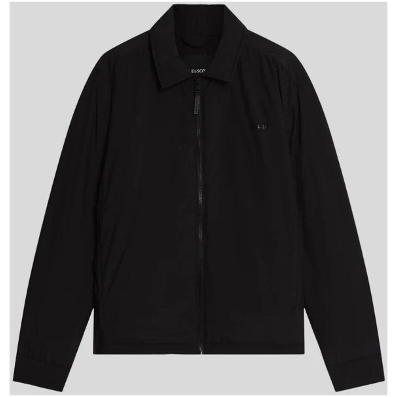 Detail close-up of the black blazer highlighting the zipper closure and collar.