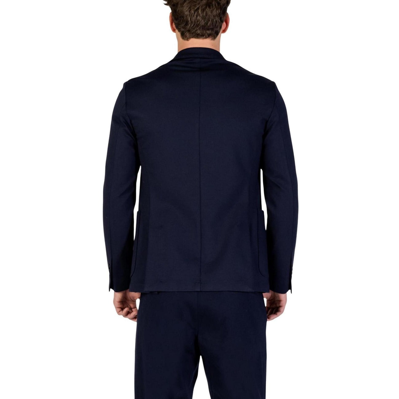 Front view of a navy suit with tailored fit and matching trousers on a white background