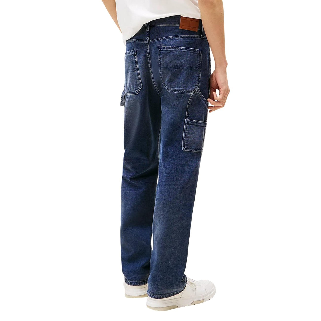 Back view of blue jeans showcasing a straight fit and back pockets on a white background.