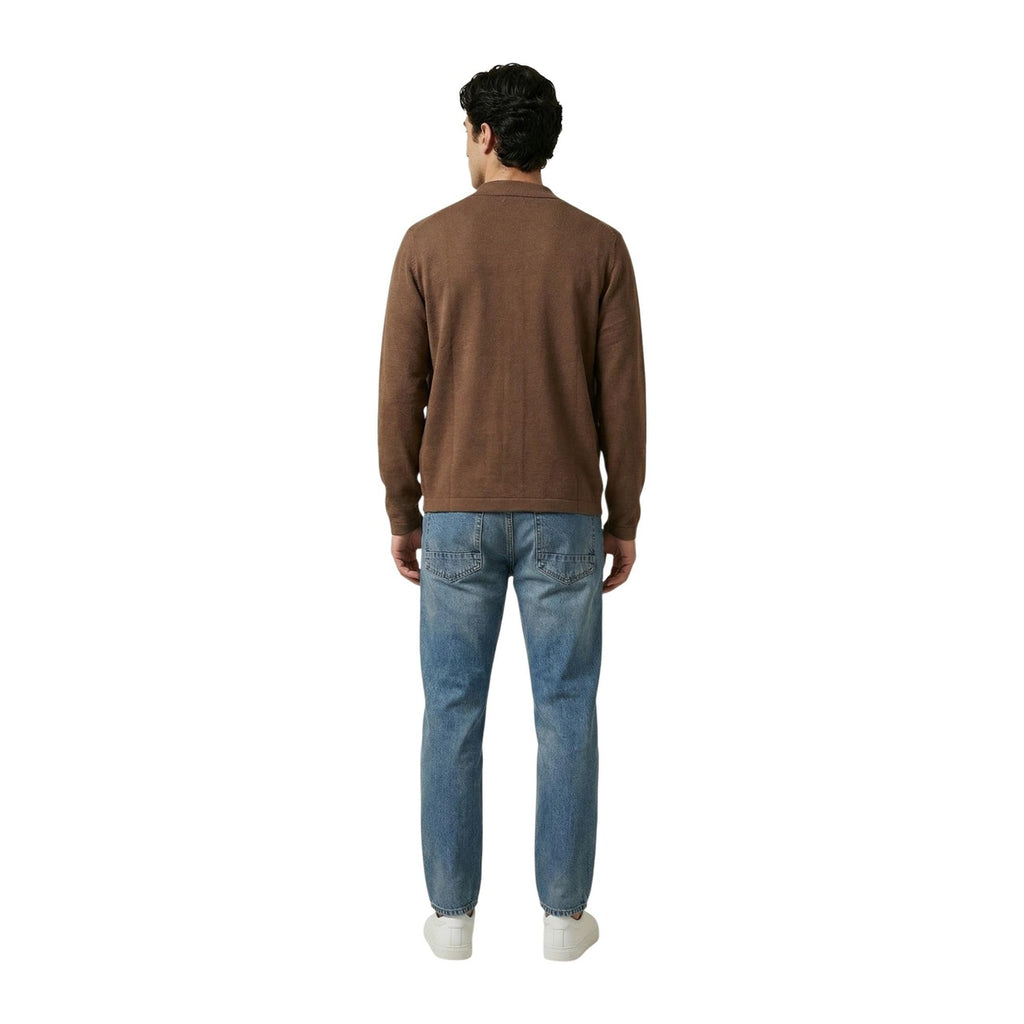 Front view of the brown jacket with button closure and pockets, showcasing brown, white, and blue colors on a white backgr…