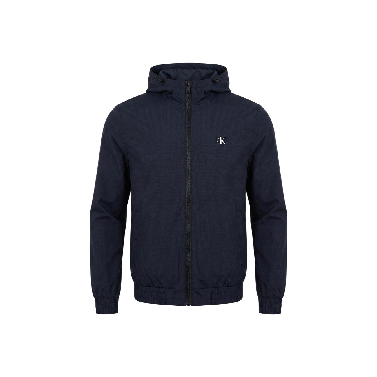 Close-up detail of a navy hoodie featuring a logo and zipper against a white background.