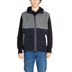 Front view of the black hooded jacket featuring a zipper closure and two-tone design.