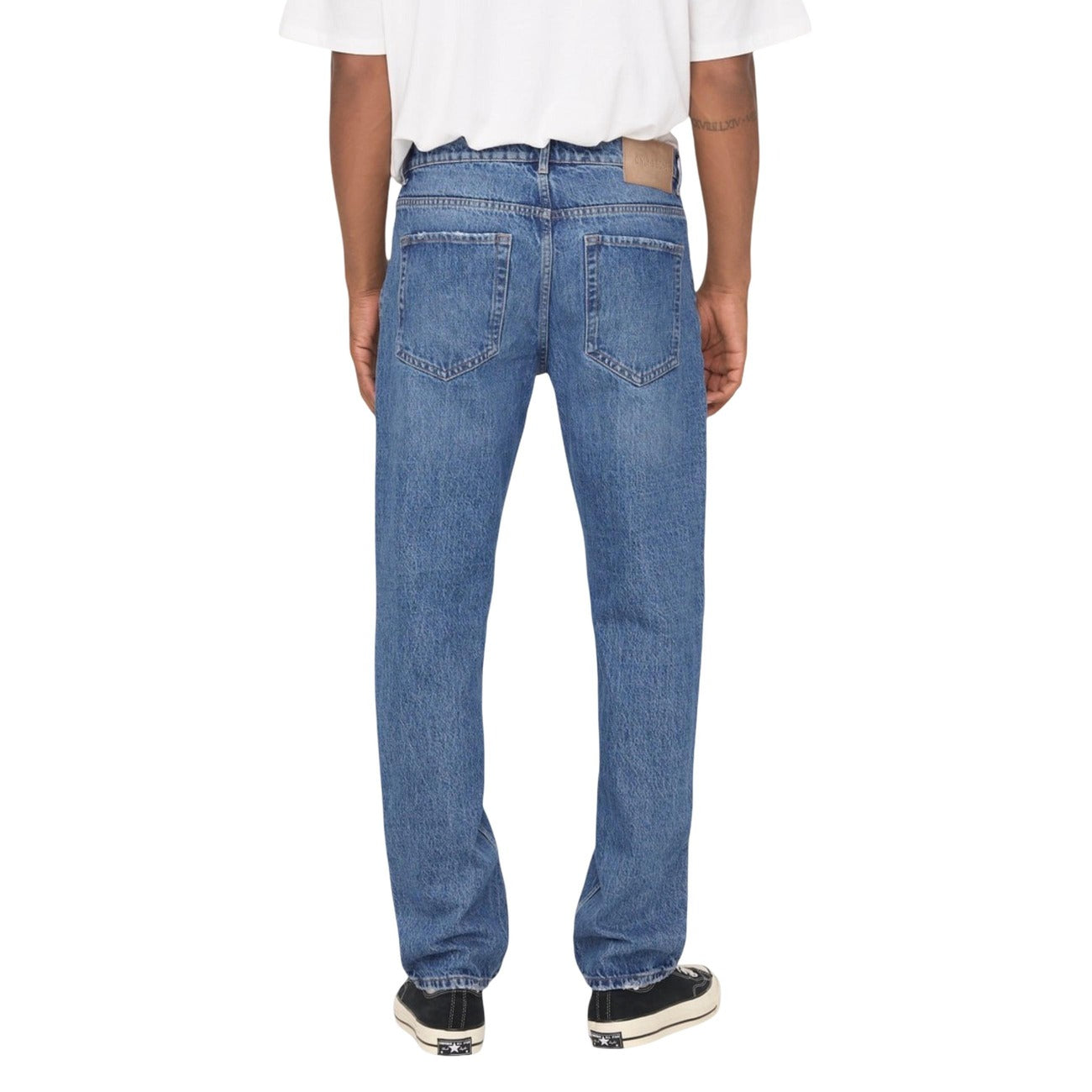 Back view of light blue straight leg jeans with casual fit on a white background