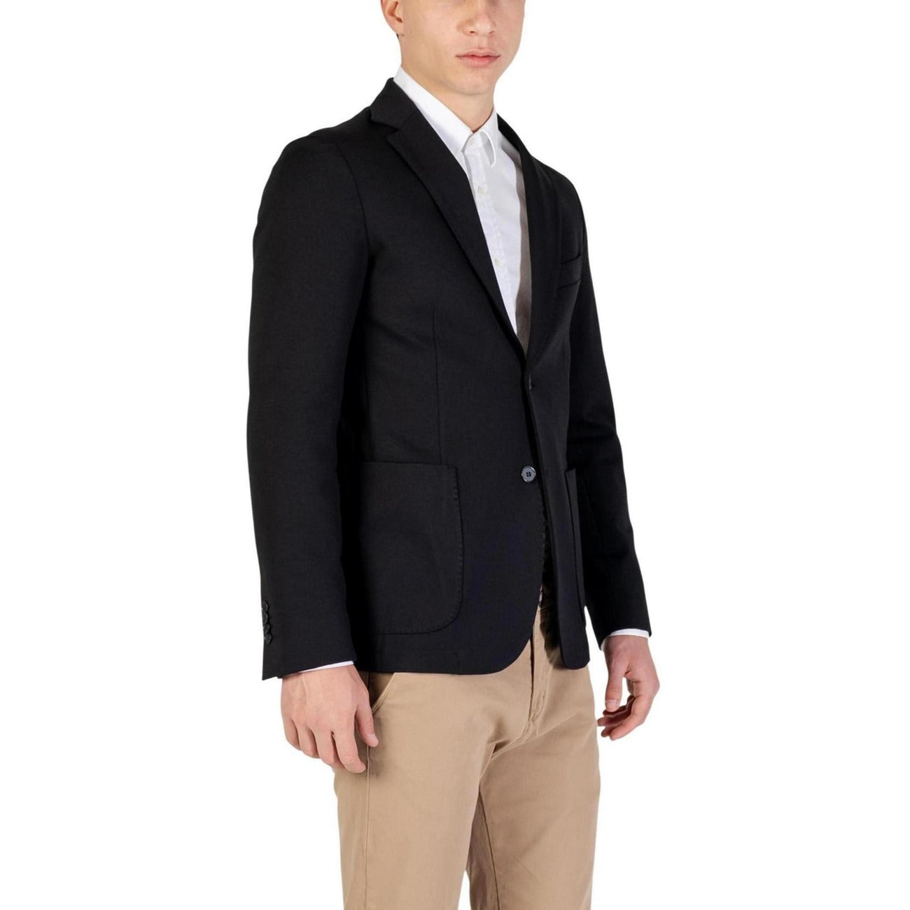 Side view of the black blazer highlighting its slim fit and smooth fabric on a white background