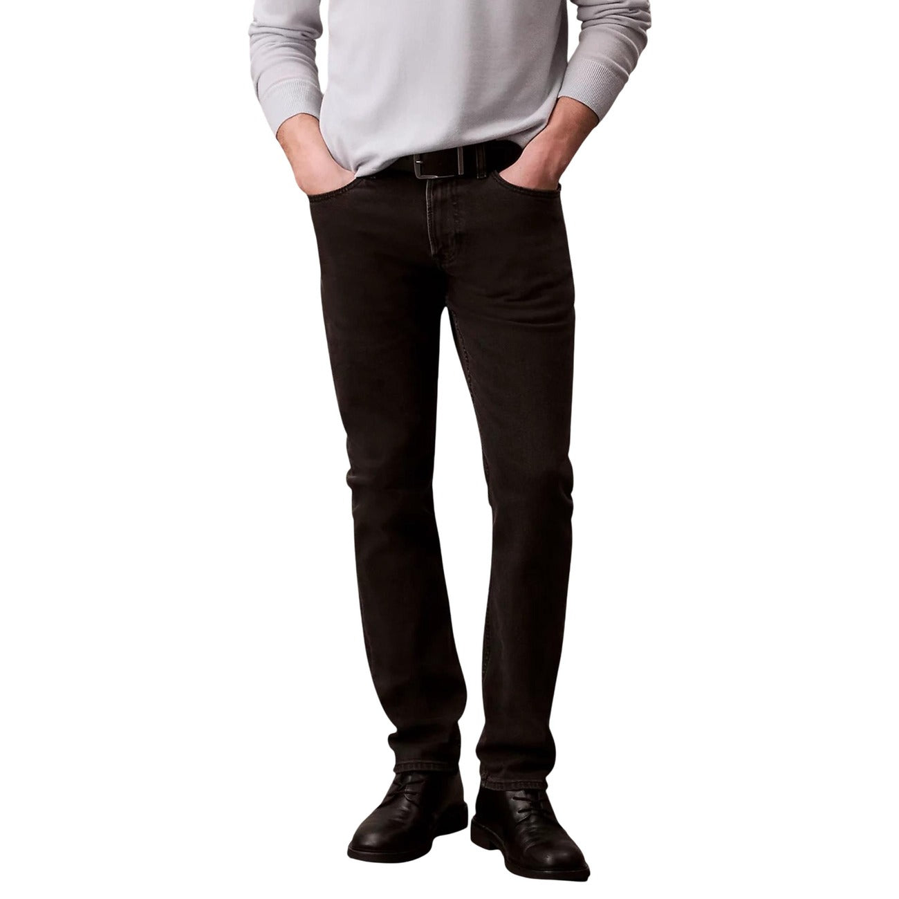 Front view of the black jeans featuring slim fit and pocket details on a white background