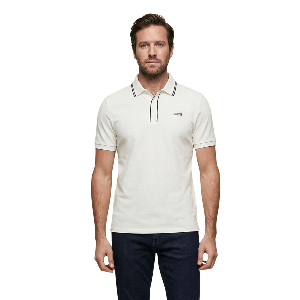 Front view of a man wearing a white collared polo shirt with short sleeves.