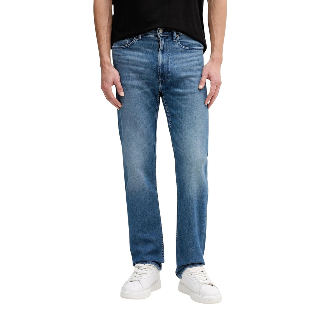Front view of blue jeans featuring a straight fit and faded wash on a white background