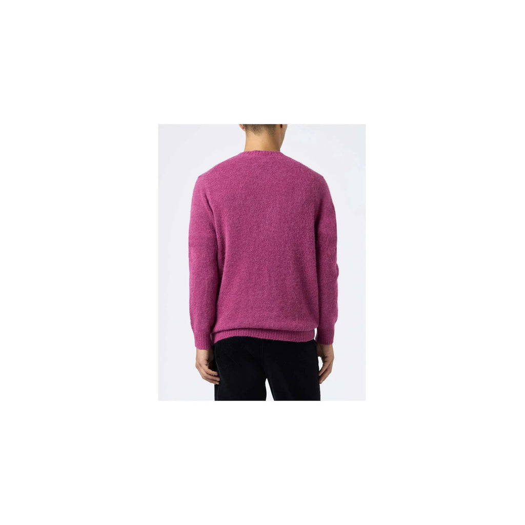 Back view of the fuchsia knitwear featuring long sleeves and crew neck on a white background
