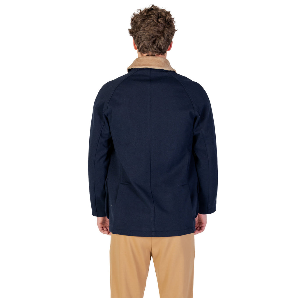 Back view of the navy blazer showing a plain back and collar on a white background