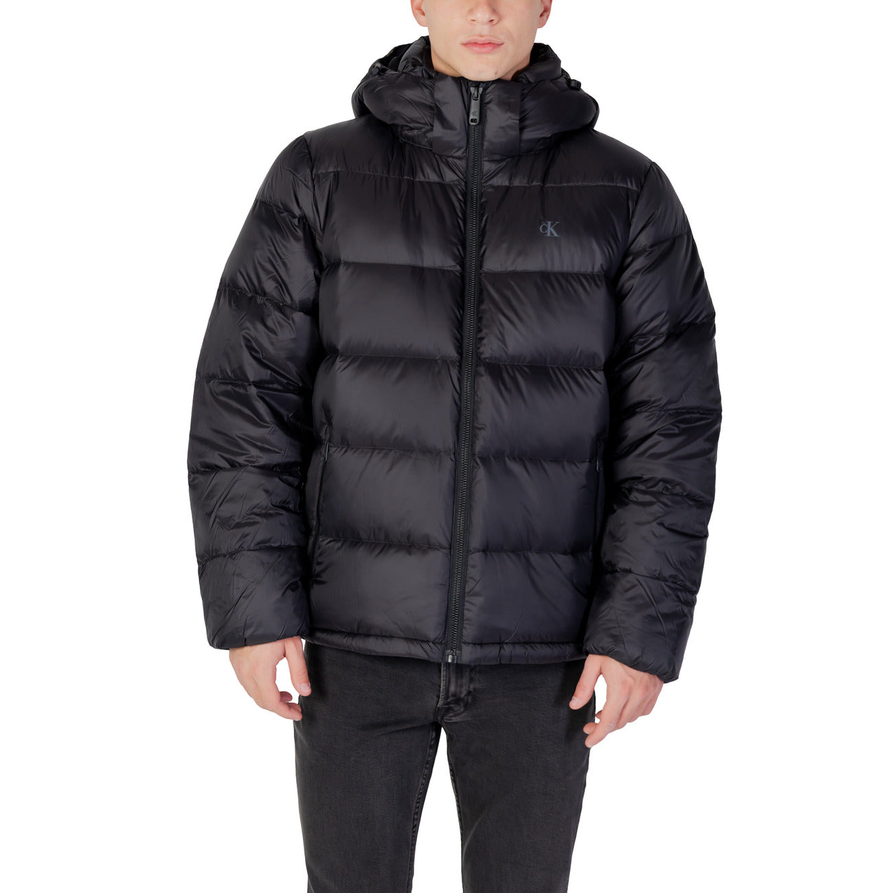 Front view of the black puffer jacket featuring a hood and zipper closure on a white background.