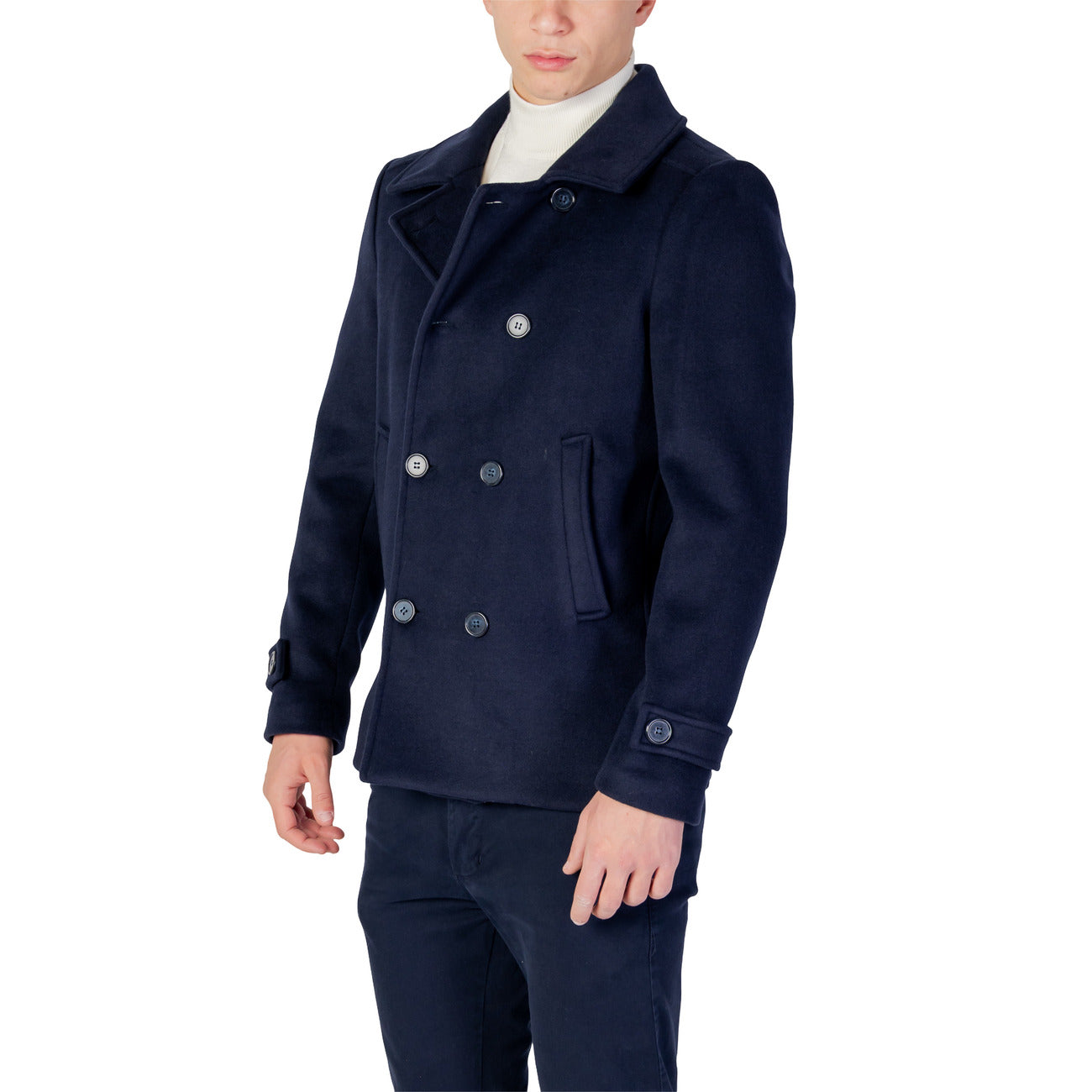 Side view of the navy double-breasted blazer showcasing the notched collar on a white background