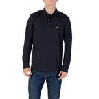 Front view of the navy long-sleeve polo shirt featuring a collar and logo on a white background.