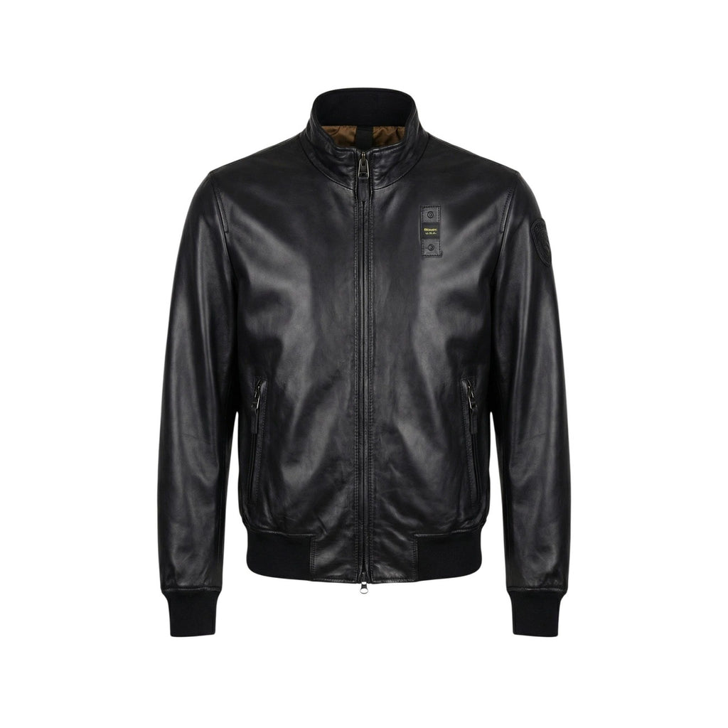 Front view of the black leather blazer featuring a zipper closure and smooth texture.