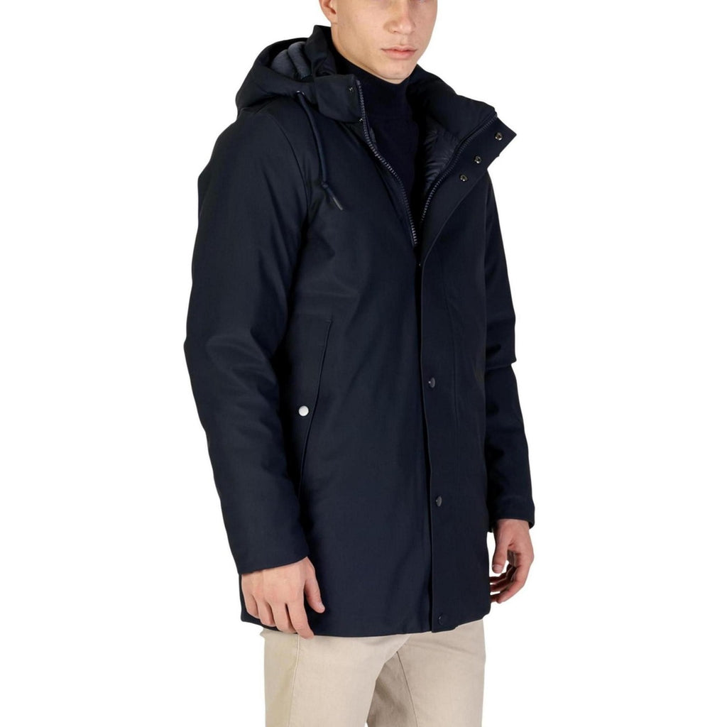 Side view of the navy jacket with a hood and zipper closure displayed on a white background.