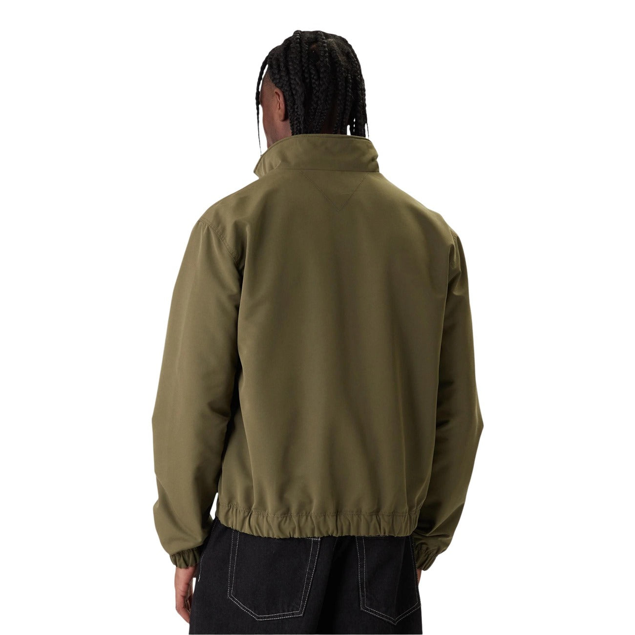 Front view of the olive green jacket with a zipper closure, highlighting its casual style in a studio background.