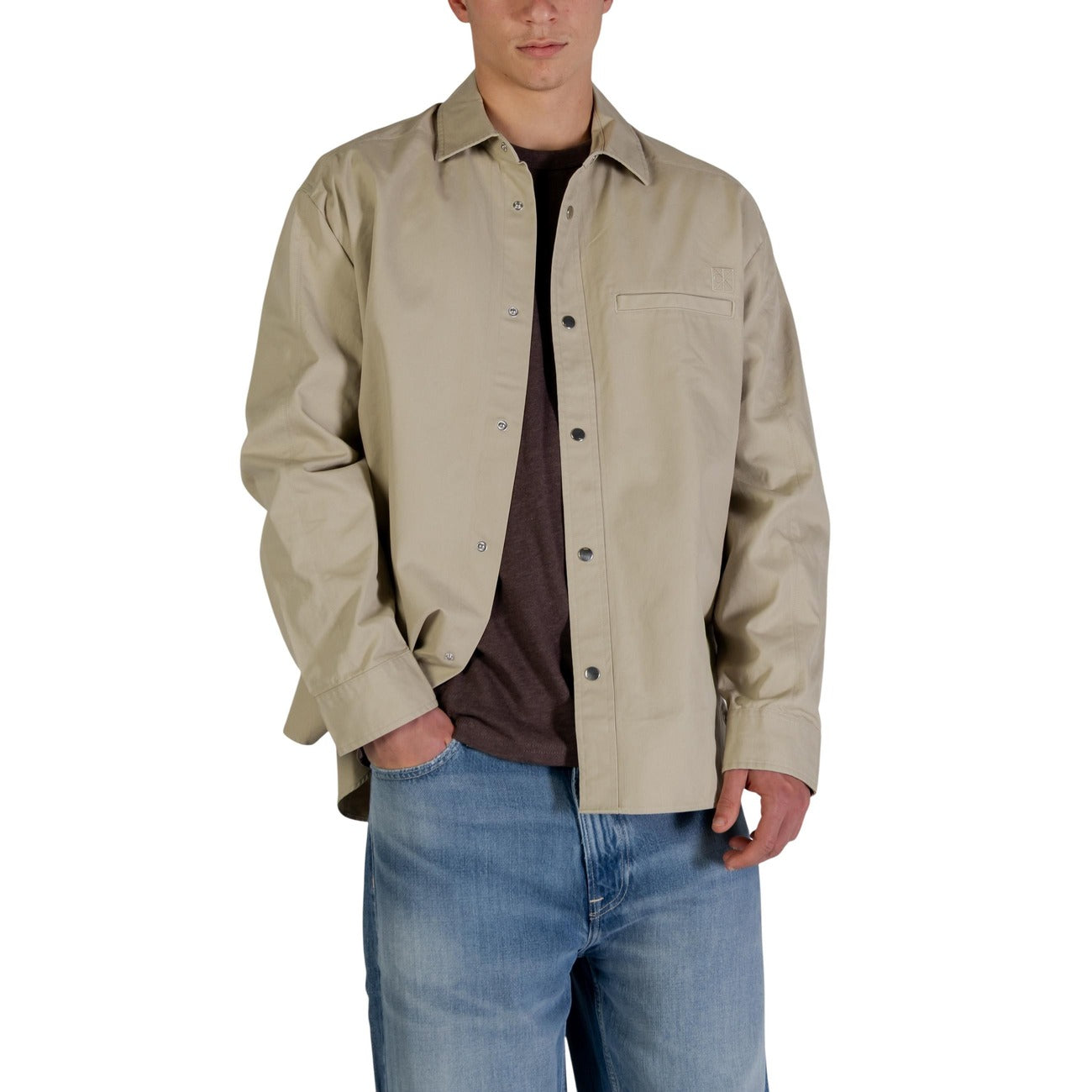Front view of the beige blazer featuring button closure and long sleeves on a white background