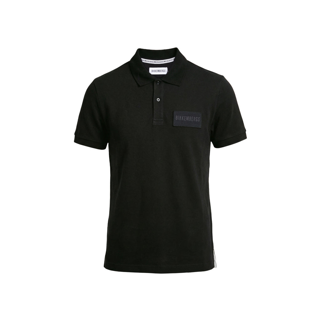 Front view of the black polo shirt featuring a collar and short sleeves against a white background.