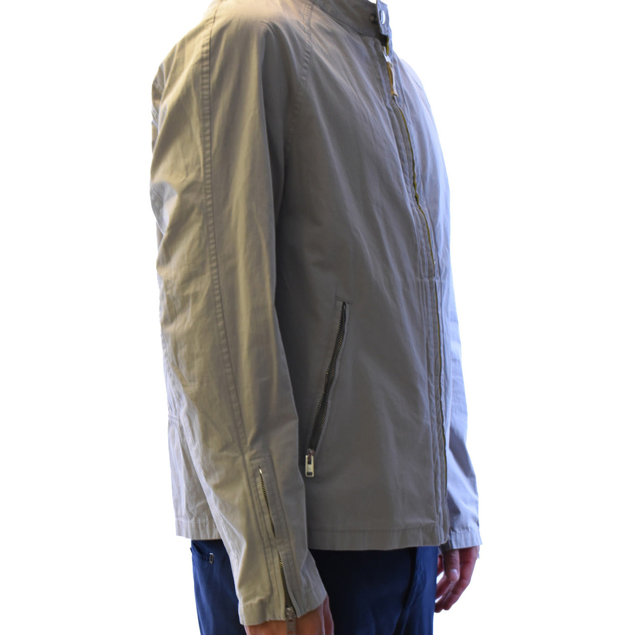 Side view of the light gray blazer featuring long sleeves and a collar on a white background