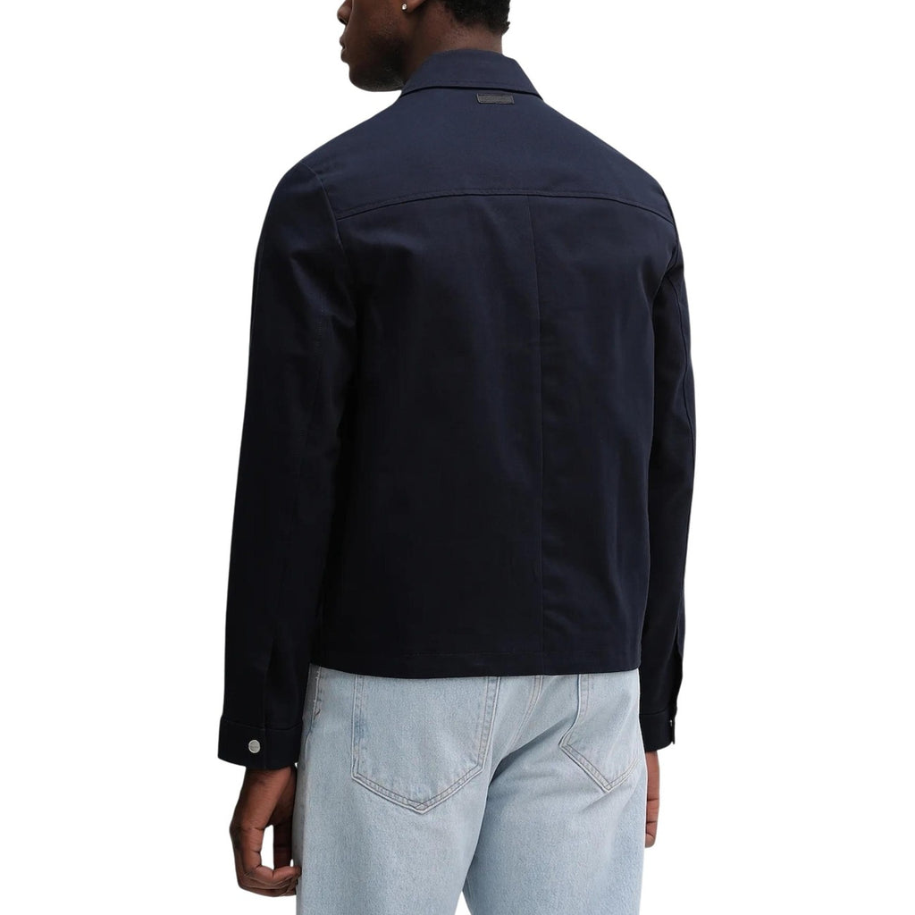 Back view of the navy blazer showcasing the collar and back detail on a white background.