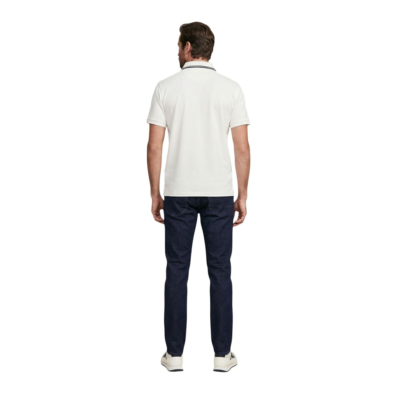 Back view of a man in a white collared polo shirt with short sleeves.