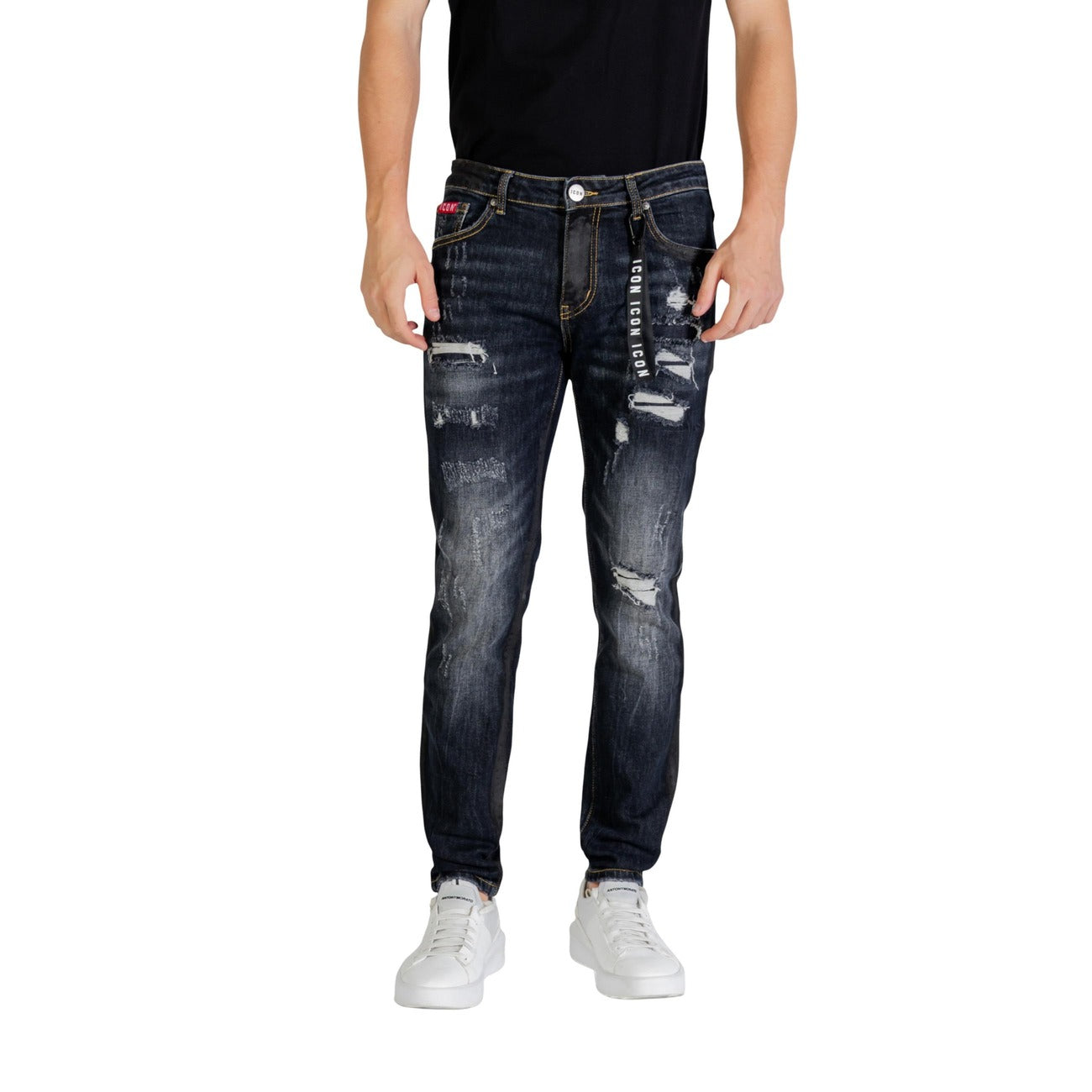 Front view of the blue distressed jeans featuring ripped details and a slim fit on a white background.