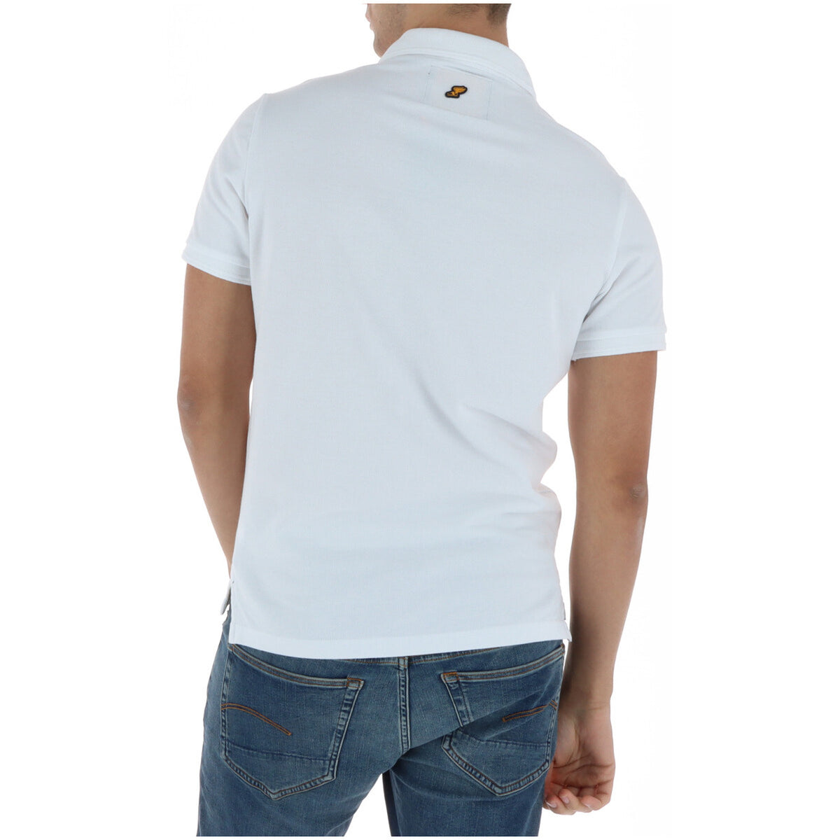 Back view of the white collared polo shirt with short sleeves.