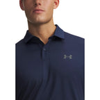 Detail close-up of the navy polo shirt's collar and logo on a white background