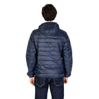 Back view of the navy puffer jacket showcasing its quilted design on a white background.