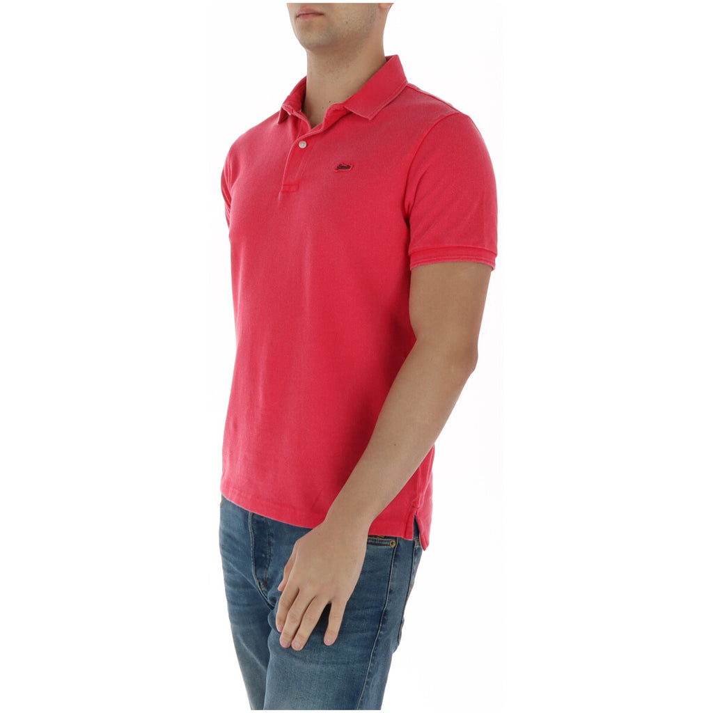 Side view of the fuchsia polo shirt showcasing short sleeves and collar on a white background