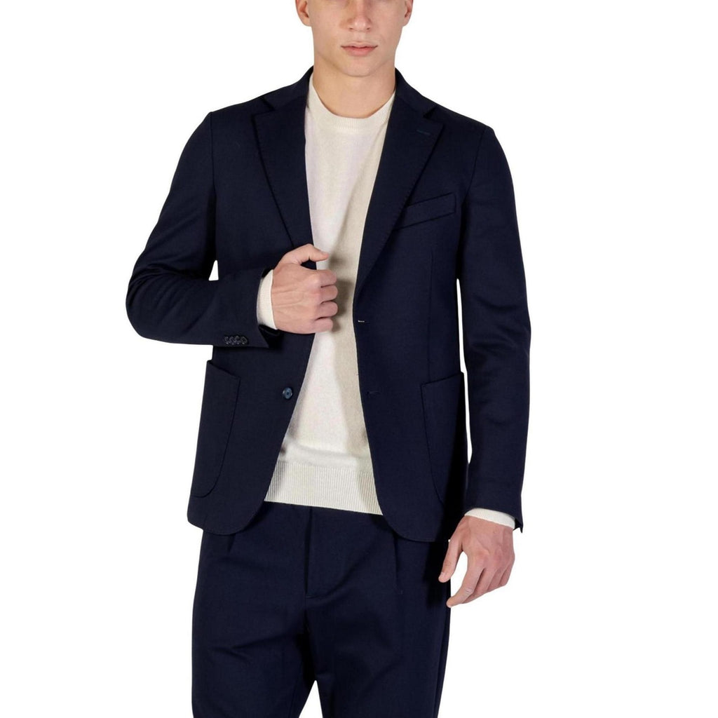 Lifestyle shot of a navy blazer with notched lapels on a white background