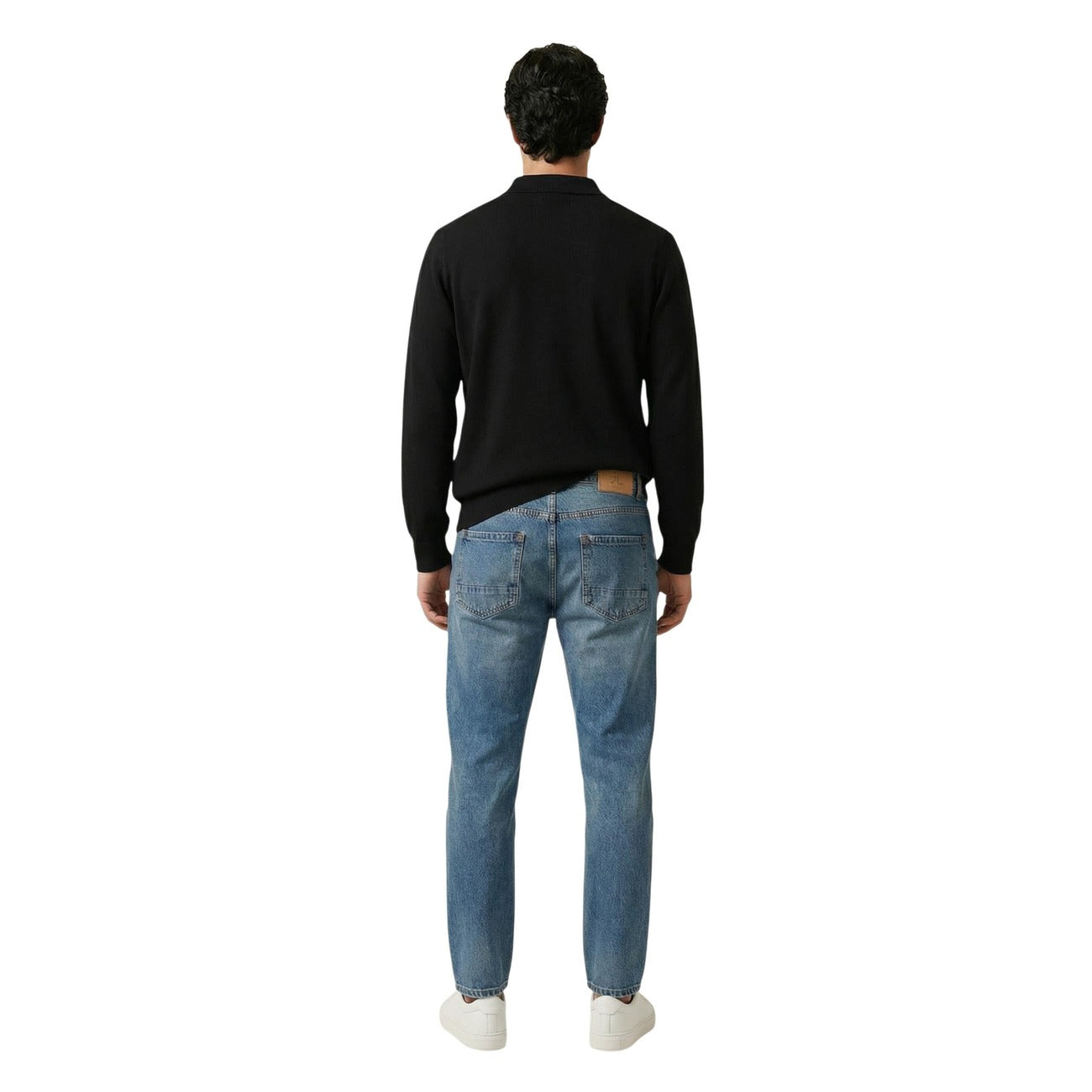 Back view of the black sweater featuring long sleeves and a classic collar on a white background