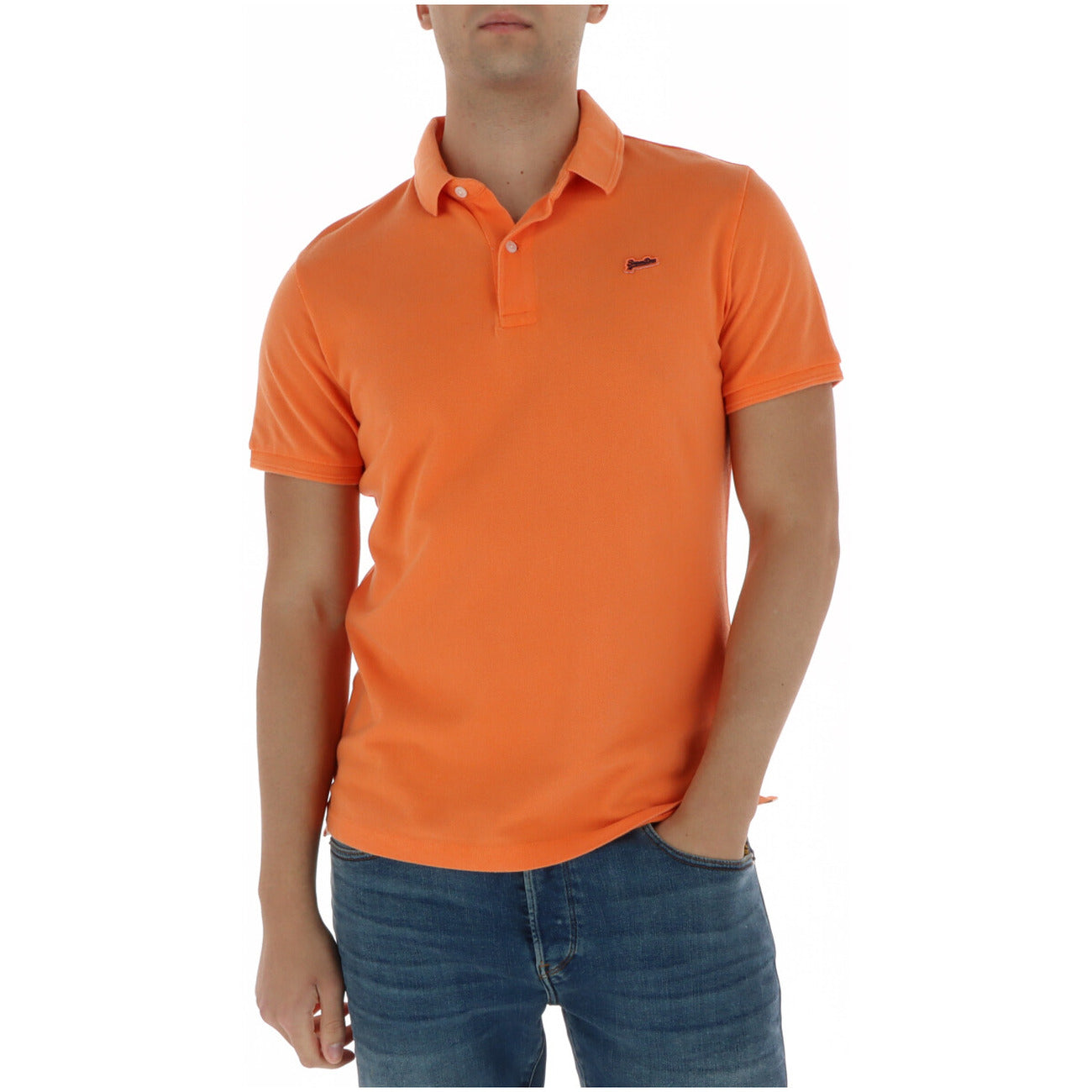 Front view of the orange polo shirt with short sleeves and a collared neckline on a white background