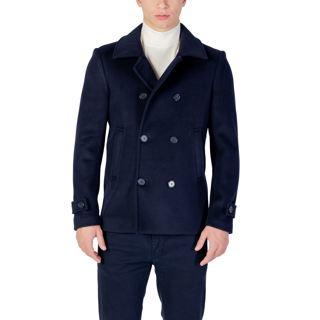 Front view of the navy double-breasted blazer with notched collar on a white background