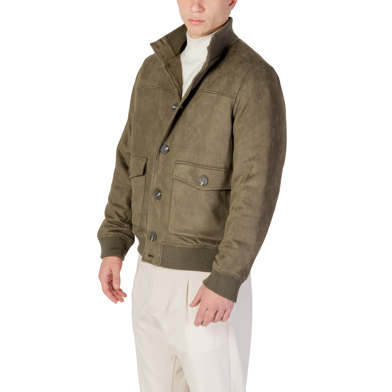 Side view of the olive green blazer with zipper closure and pockets on a white background