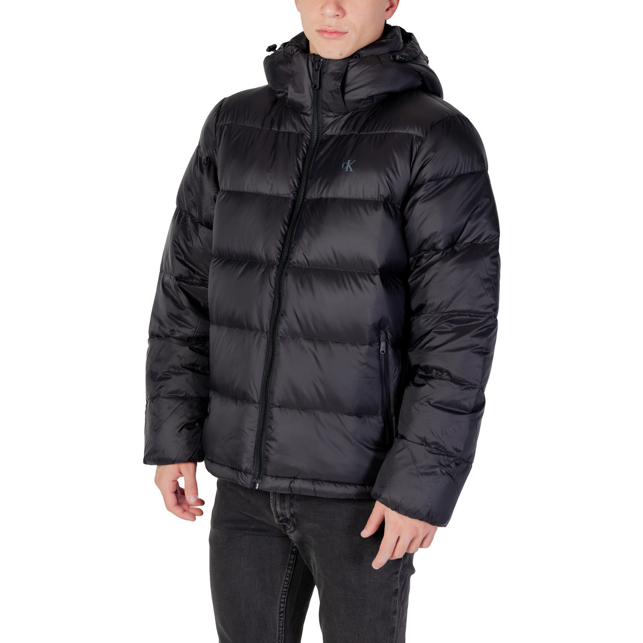 Side view of the black puffer jacket with a hood and zipper closure on a white background.