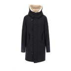 Front view of the black Peuterey men's blazer featuring a fur collar and zipper closure against a white background.