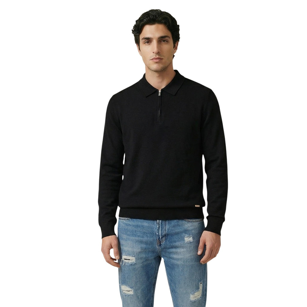 Front view of the black sweater with long sleeves and a classic collar on a white background