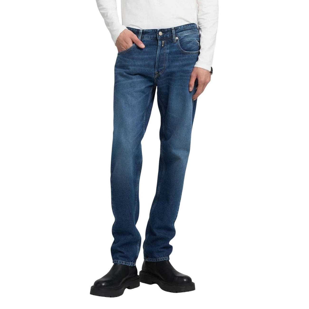 Front view of blue jeans featuring a slim fit and faded wash on a white background